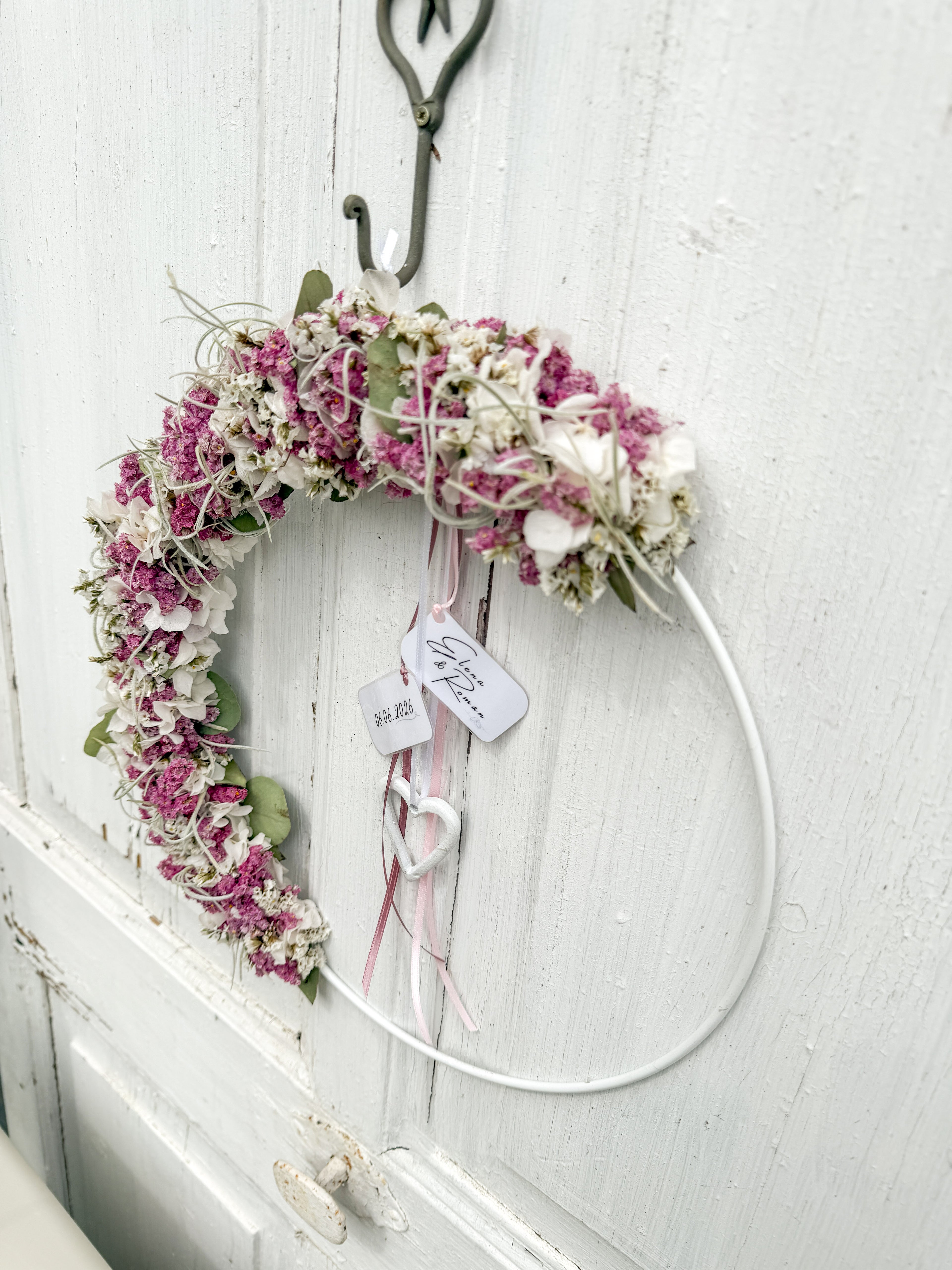 Floraler Loop zur Hochzeit mit Datum und Namen